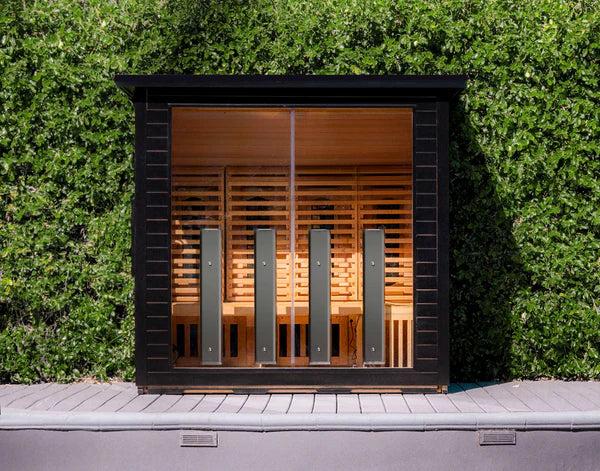 R3X Premium Outdoor Sauna front exterior view with cedar wood panels and glass door